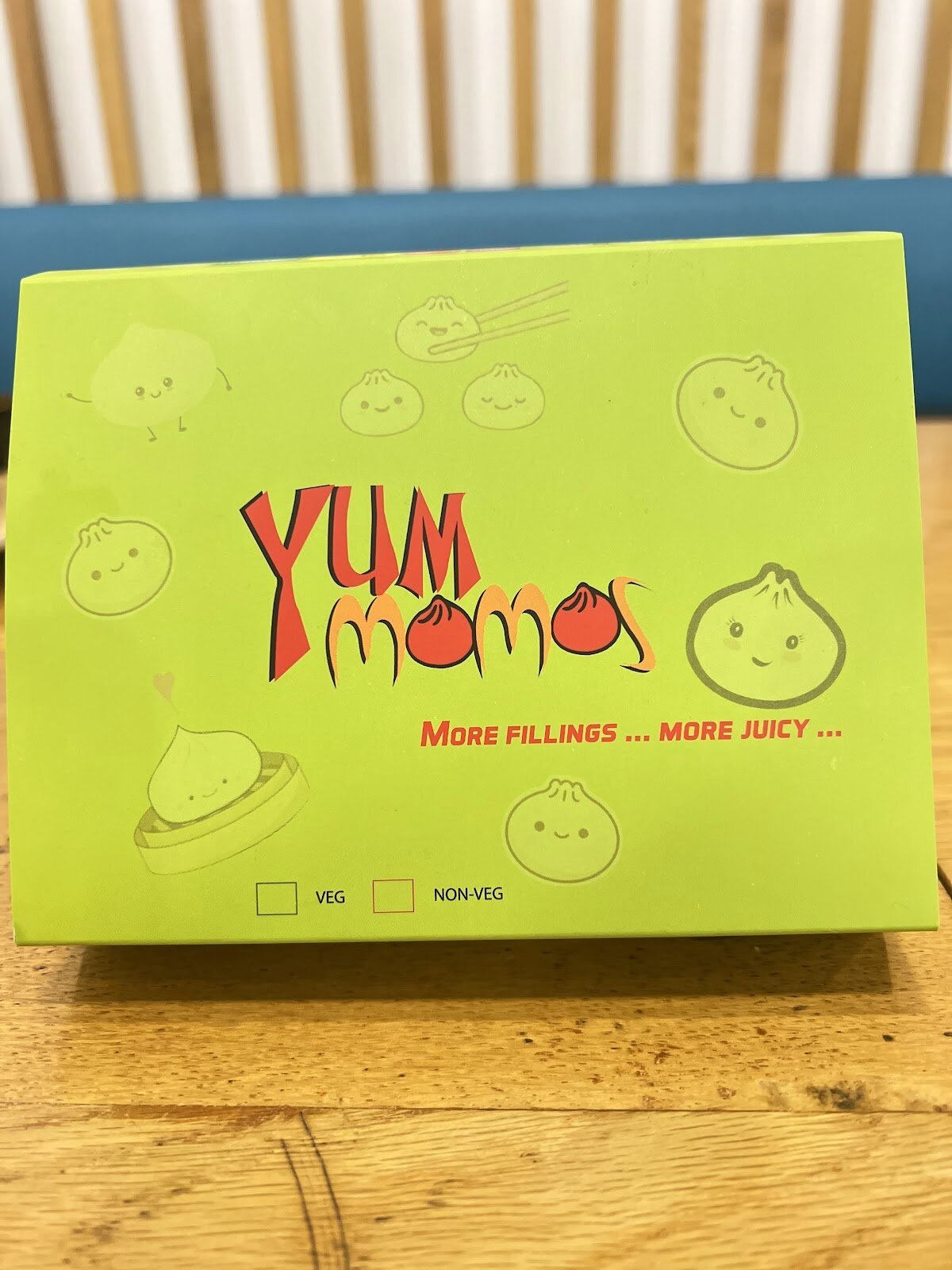 Yum Momos logo