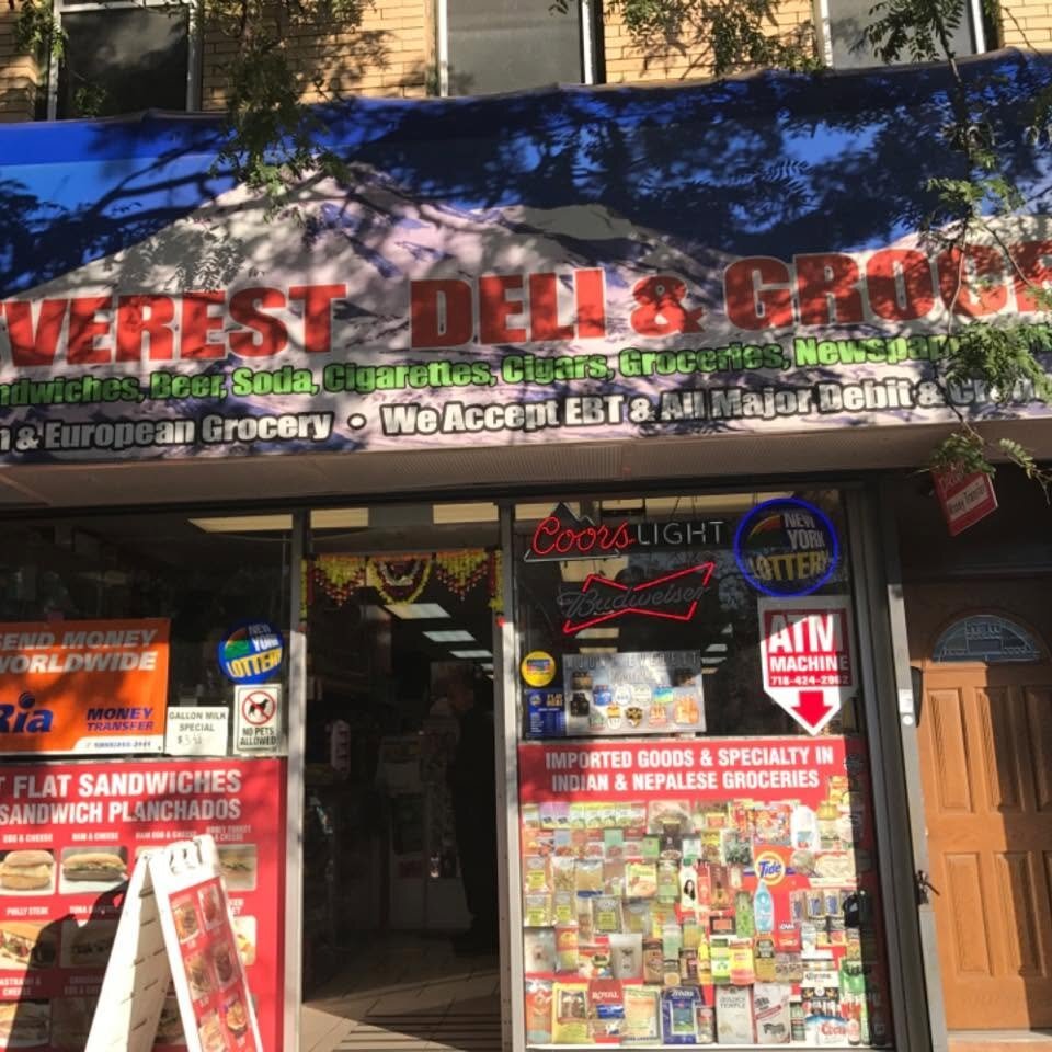Mount Everest Deli & Grocery logo